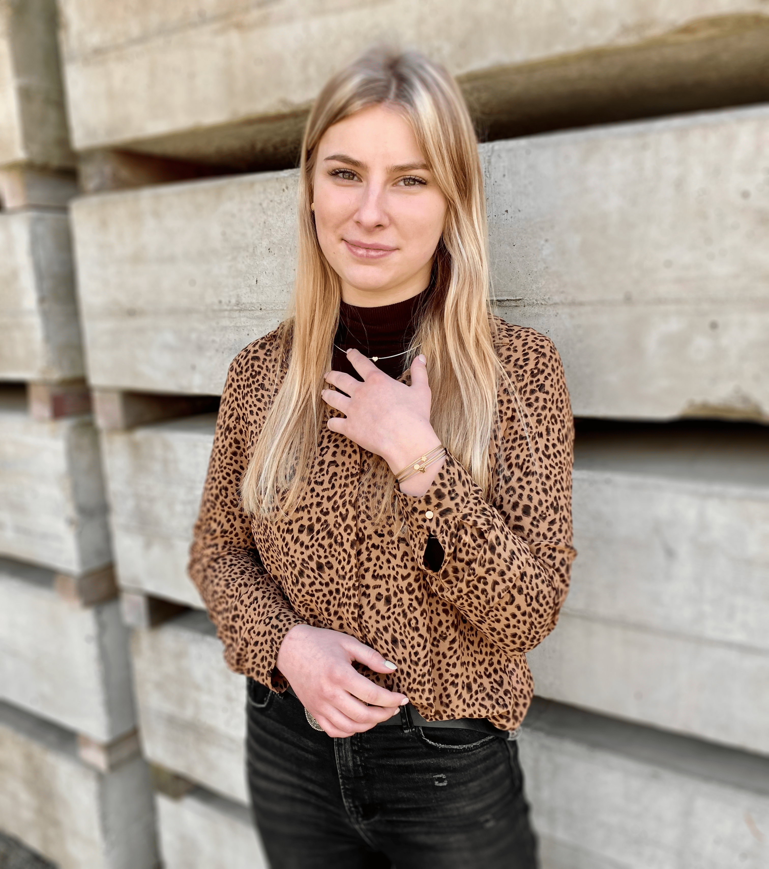 Woman wearing Thinking of You bracelet with bicolour butterfly charm | CLIC by Suzanne